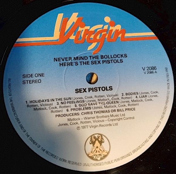 Flesh coloured Virgin logo on labels